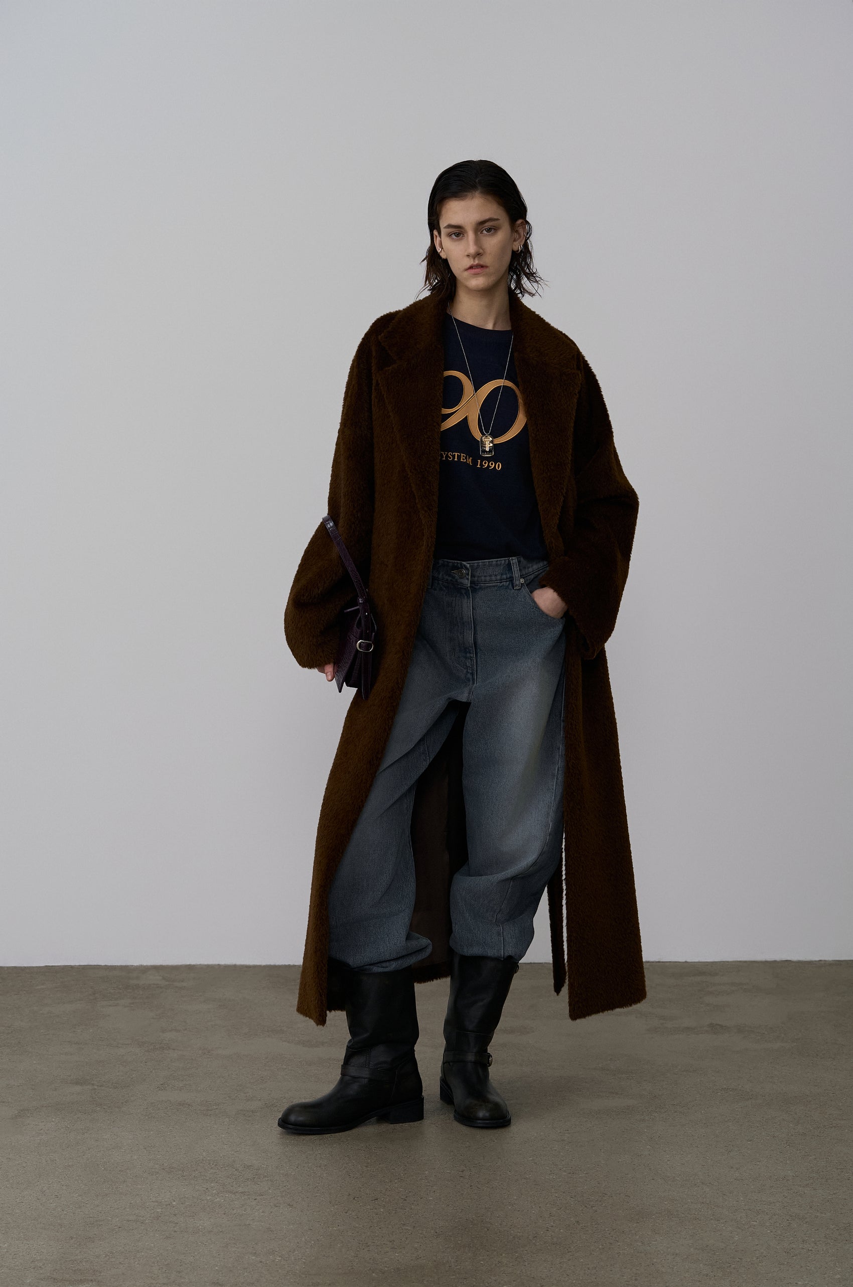 TWISTED-SEAM DENIM PANTS