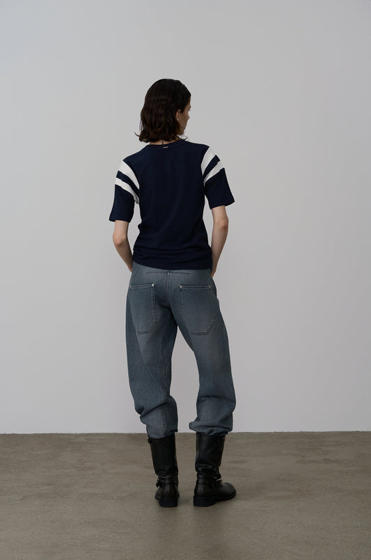 TWISTED-SEAM DENIM PANTS