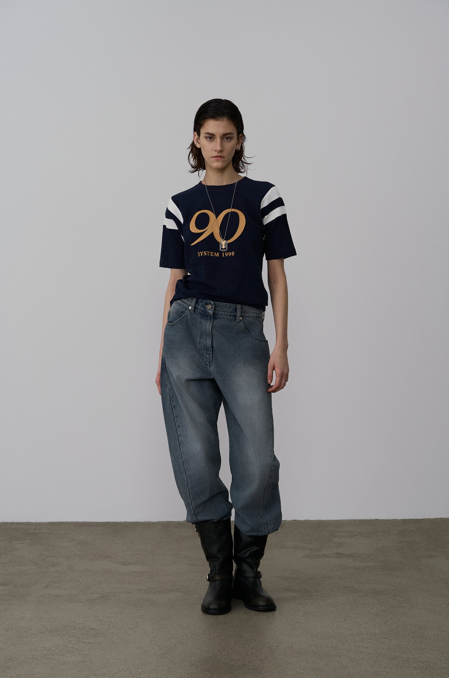 TWISTED-SEAM DENIM PANTS