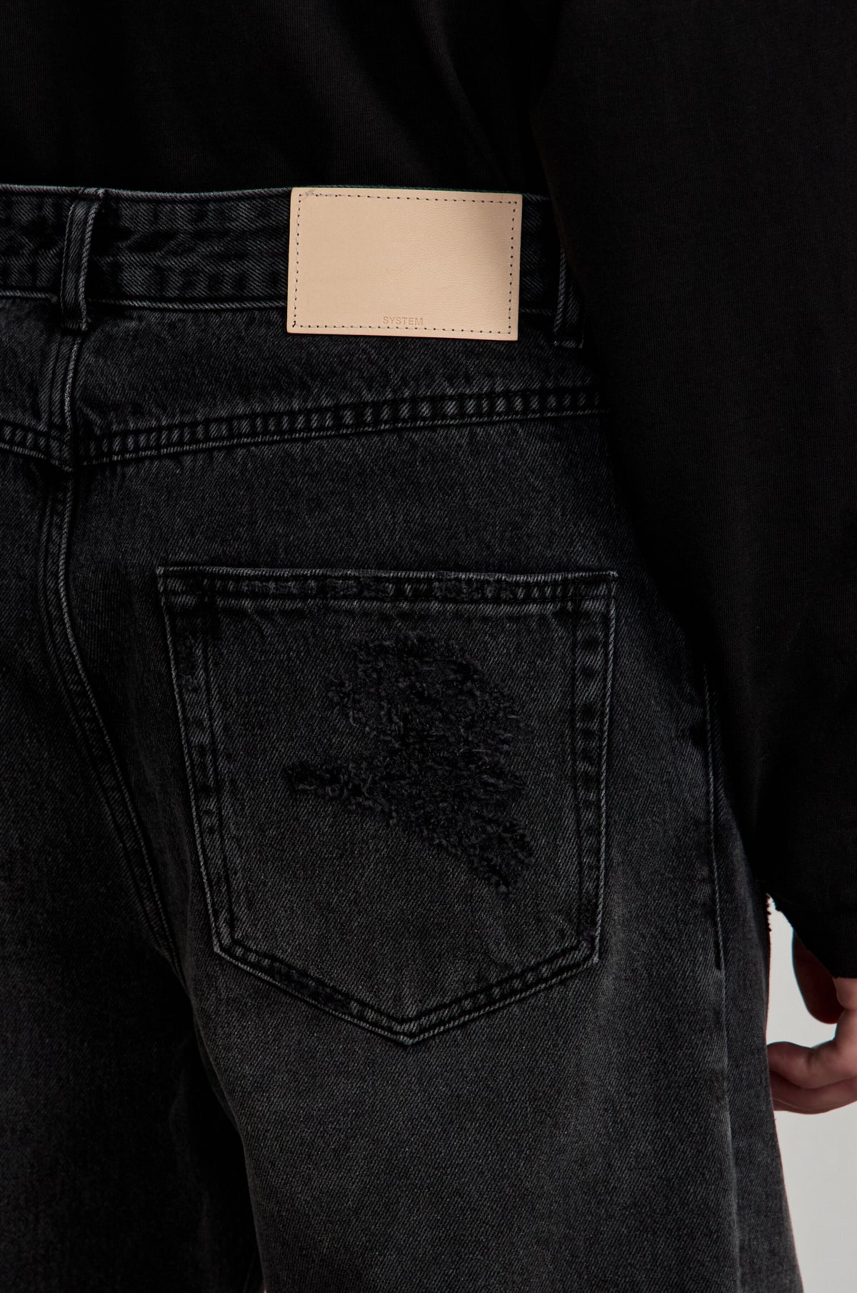 DISTRESSED STRAIGHT DENIM PANTS