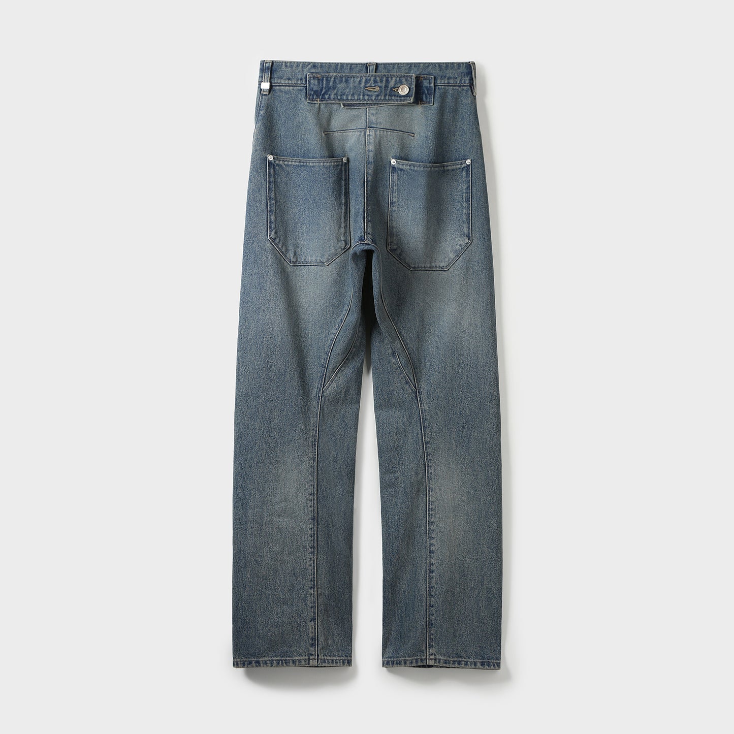 TWISTED-SEAM DENIM PANTS