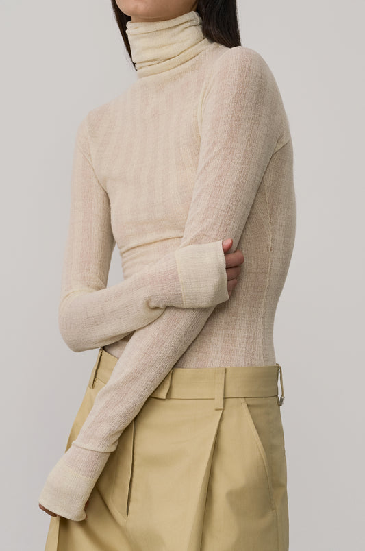 SUBTLE STRIPED WOOL JERSEY HIGH-NECK TOP