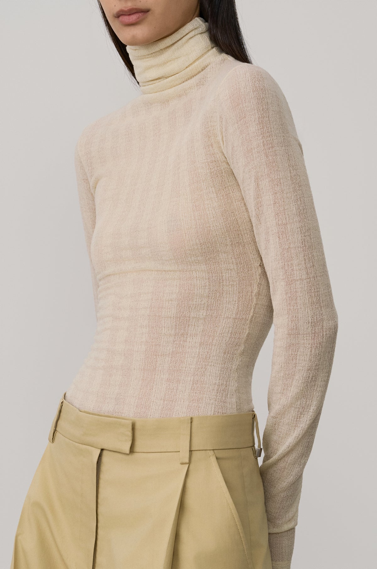SUBTLE STRIPED WOOL JERSEY HIGH-NECK TOP