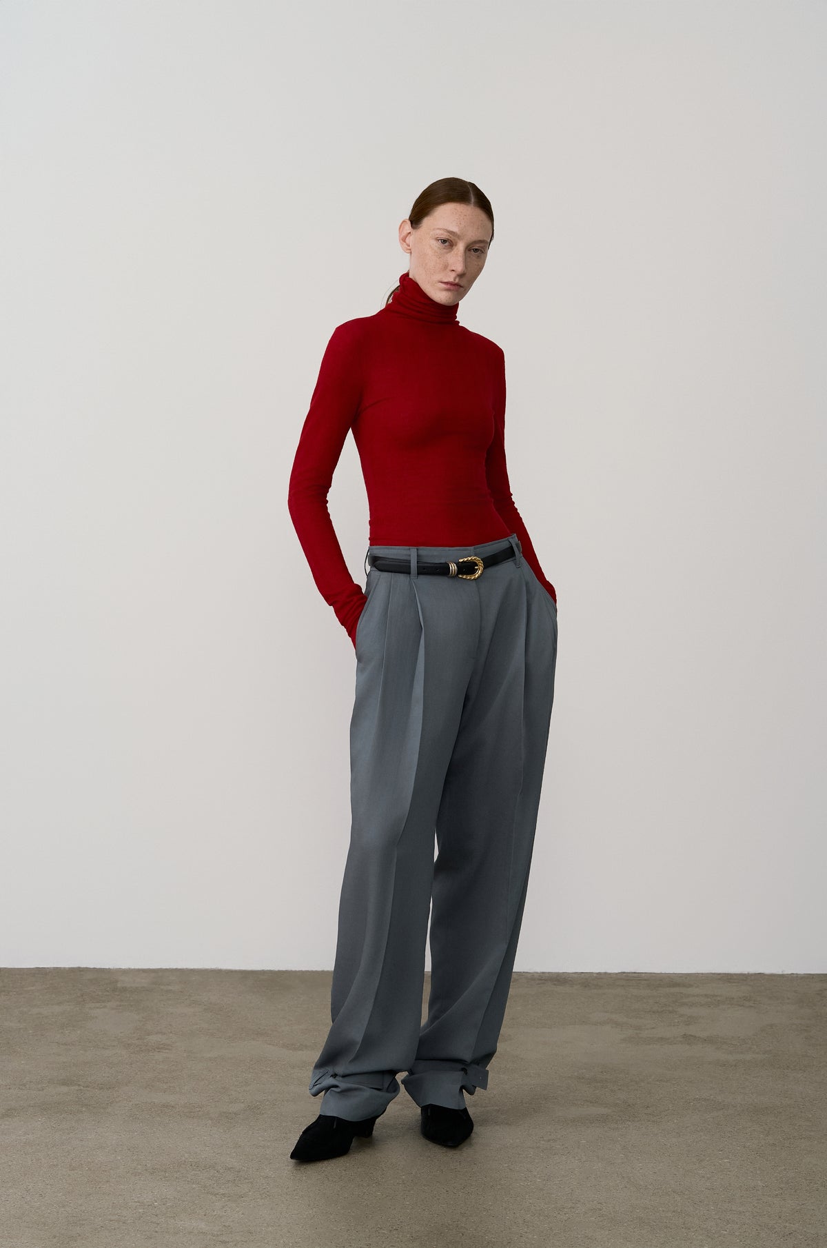 SUBTLE STRIPED WOOL JERSEY HIGH-NECK TOP