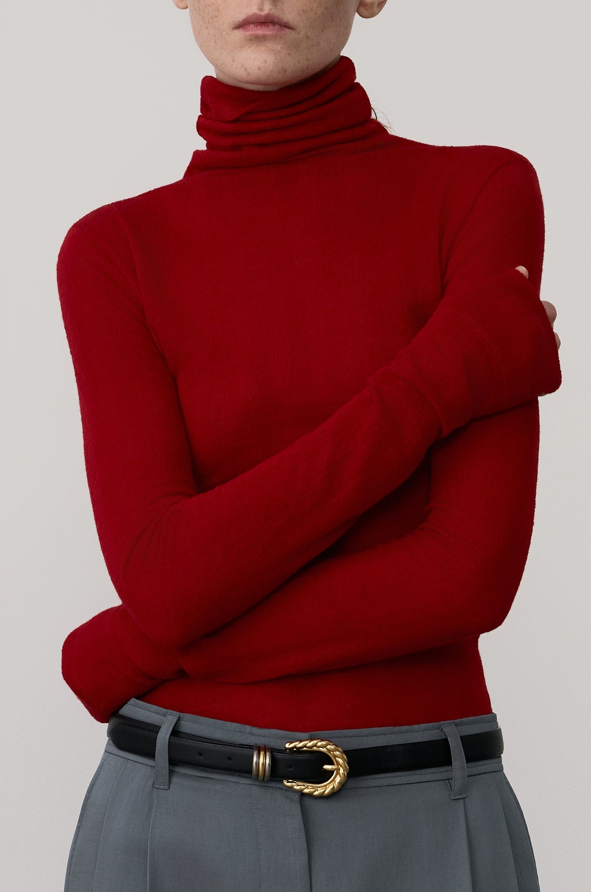 SUBTLE STRIPED WOOL JERSEY HIGH-NECK TOP