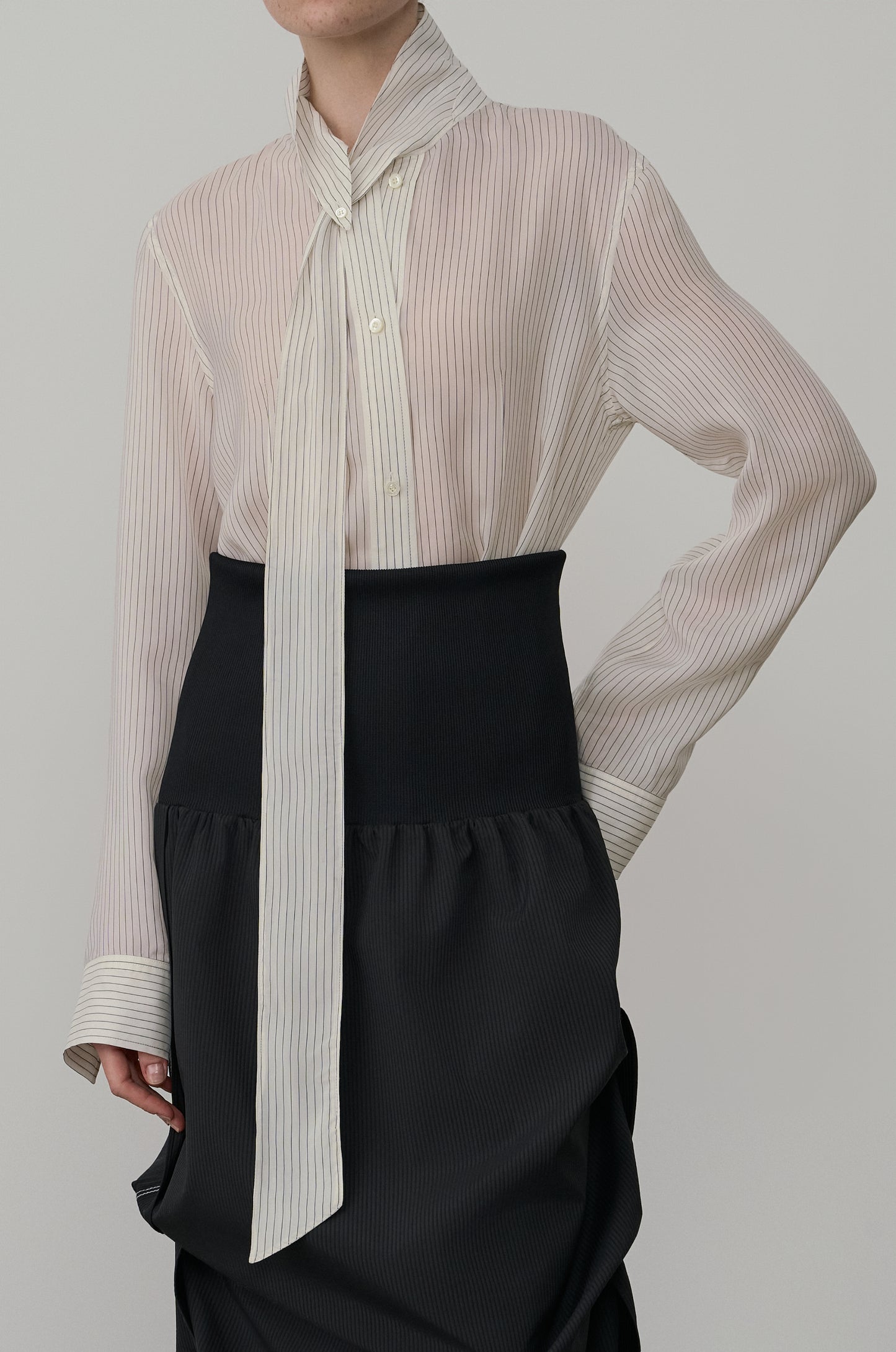ASYMMETRIC NECKLINE DRAPED BLOUSE