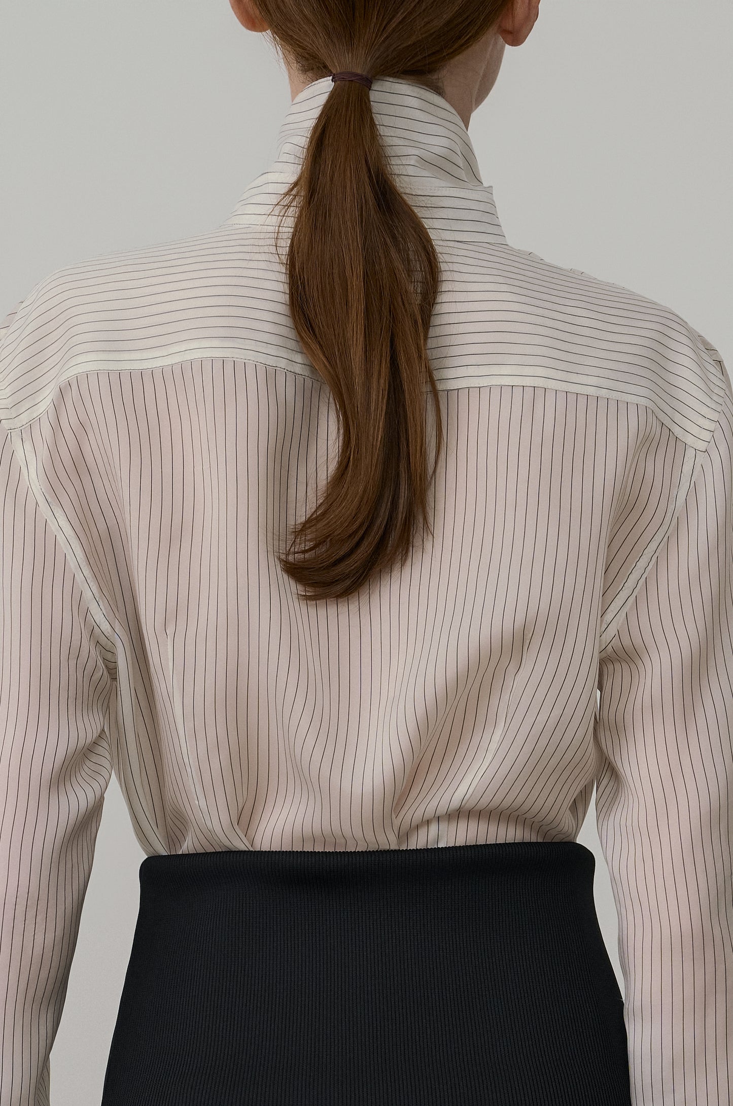 ASYMMETRIC NECKLINE DRAPED BLOUSE