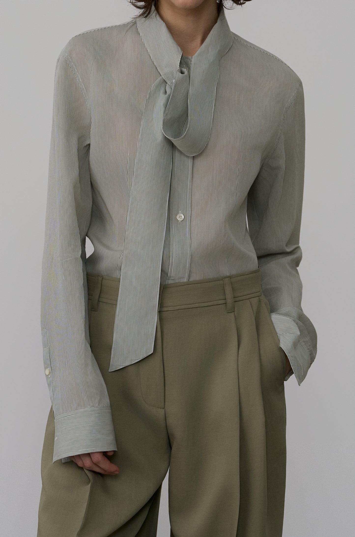 ASYMMETRIC NECKLINE DRAPED BLOUSE