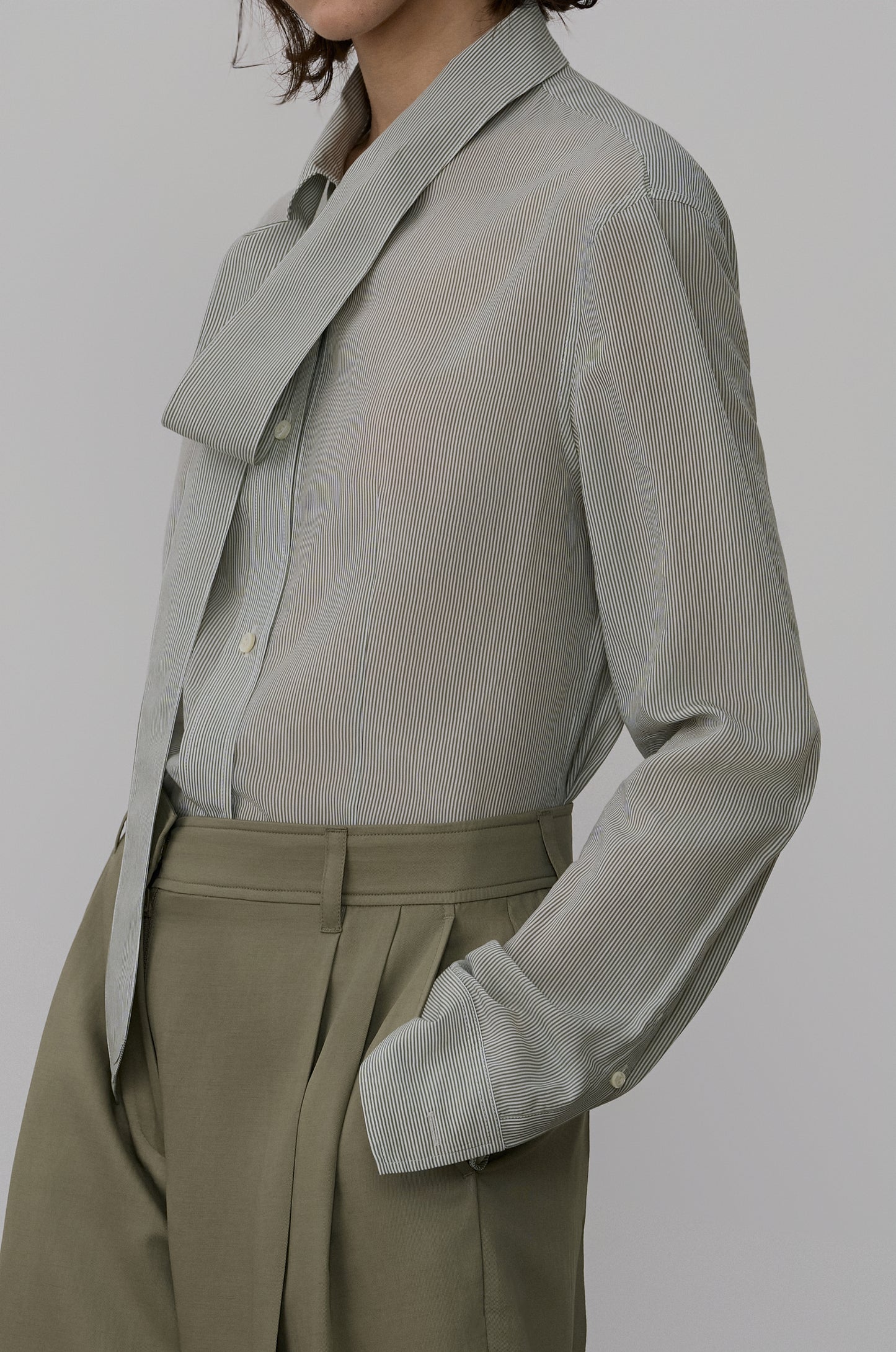 ASYMMETRIC NECKLINE DRAPED BLOUSE