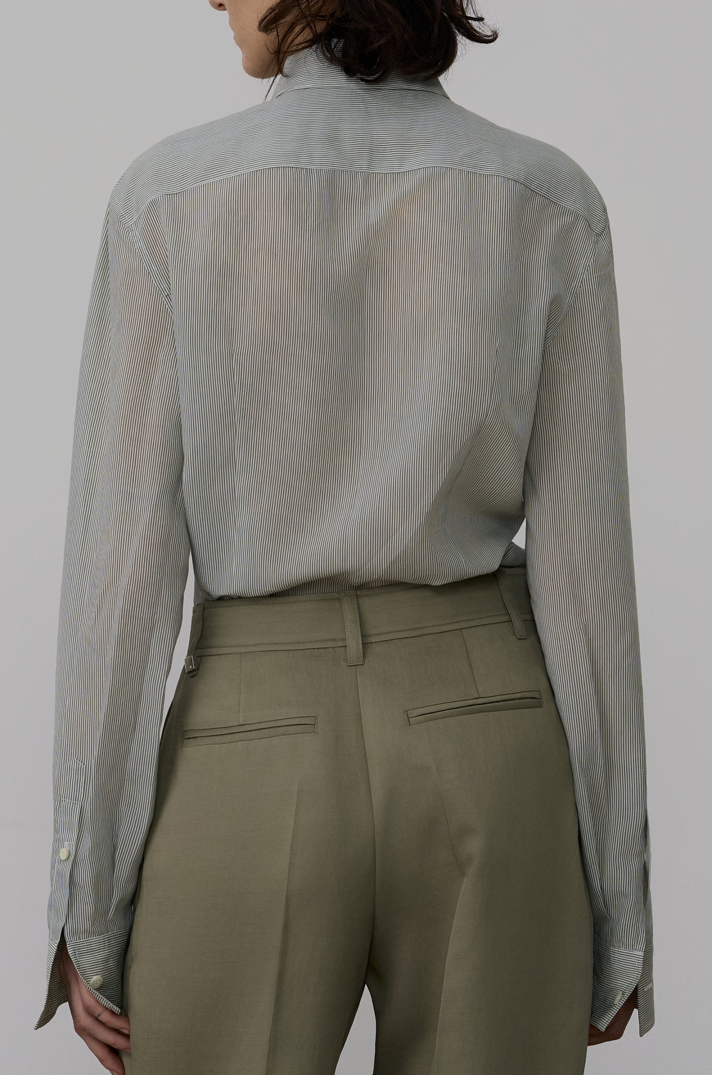 ASYMMETRIC NECKLINE DRAPED BLOUSE